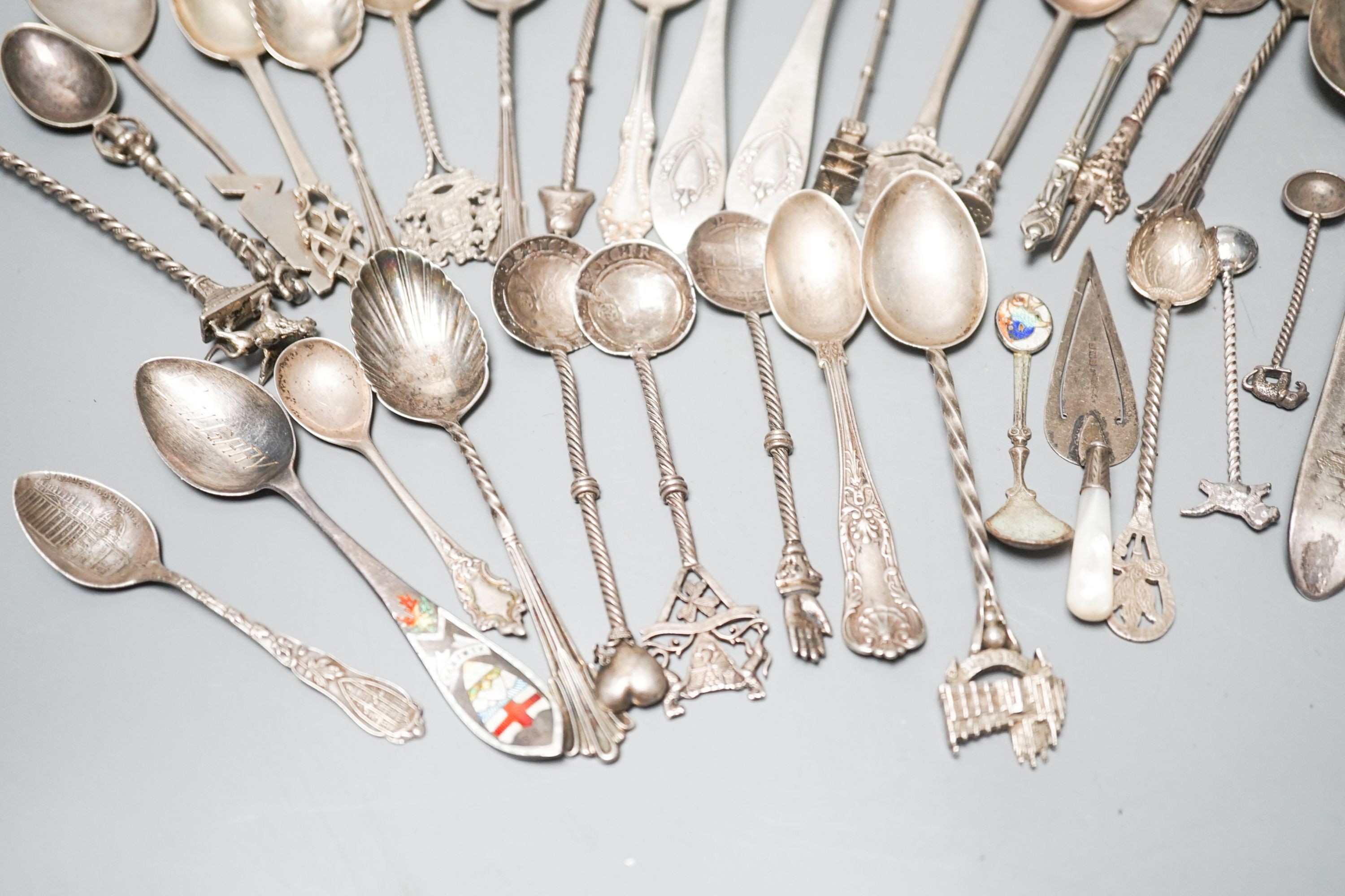 A group of assorted mainly silver and white metal minor flatware and a silver bookmark.